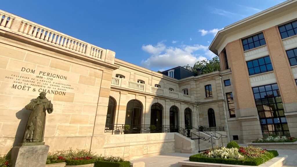 Moët & Chandon visitor center with Dom Pérignon statue in Epernay