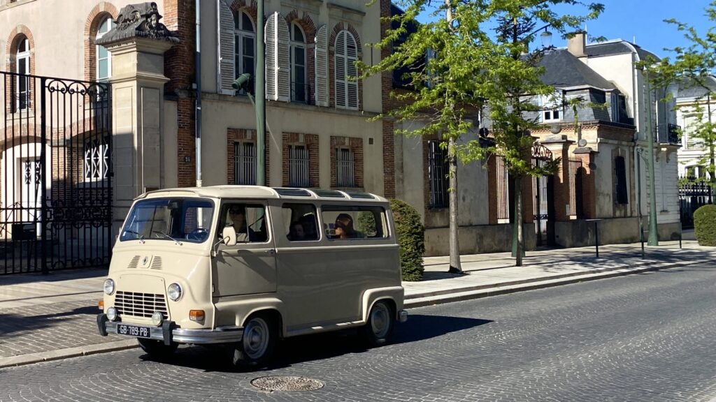 Vintage van tour on Avenue de Champagne in Épernay, France
